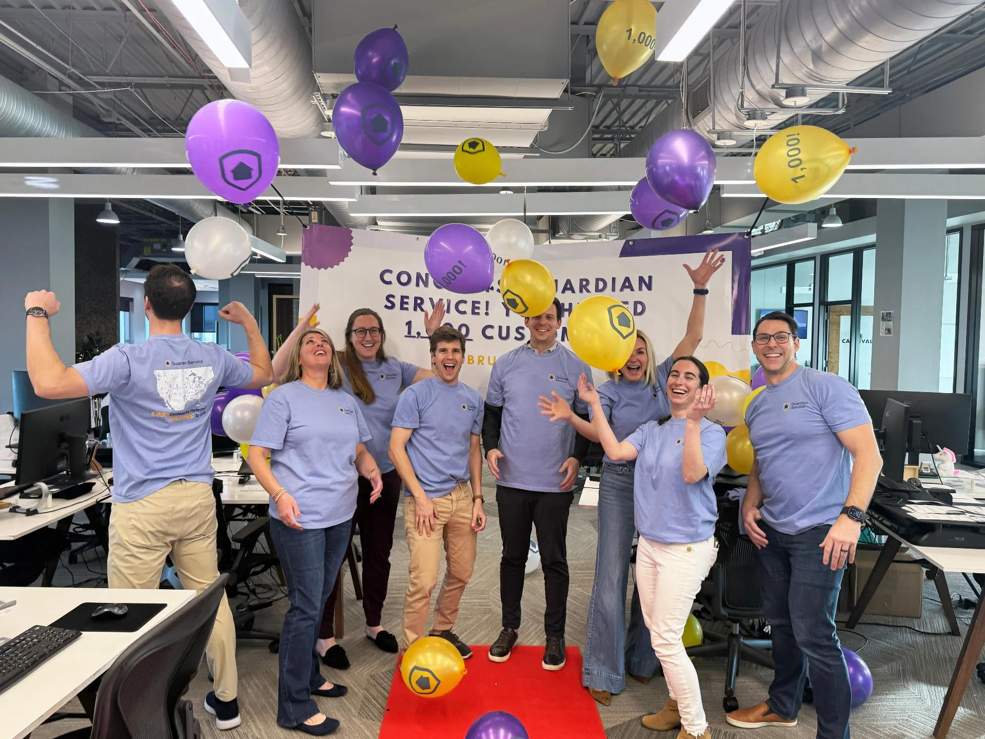 Guardian Service milestone celebration with team